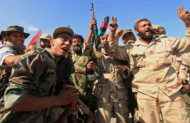 Anti-Gaddafi fighters celebrated the fall of Sirte (Pic: Reuters)
