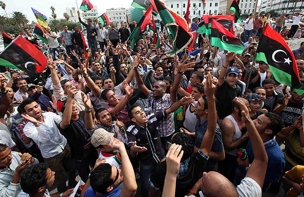 Libyans celebrate at Martyrs square in Tripoli after hearing the news that Libyan leader Gaddafi was killed in Sirte (Pic: Reuters)