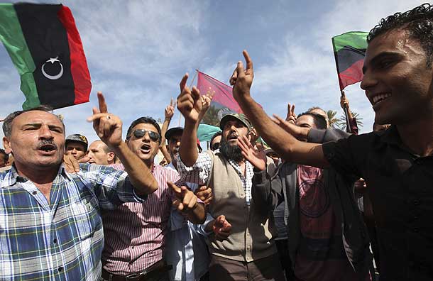 Libyans celebrate at Martyrs square in Tripoli after hearing the news that Libyan leader Gaddafi was killed in Sirte (Pic: Reuters)