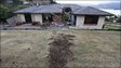 House hit by a boulder in Lyttelton, new Zealand, on 24 February 2011