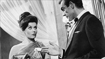 Bond handing out a business card