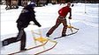 Two competitors kick-sledging