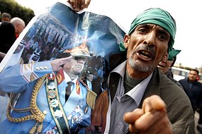 Defiant: A supporter of Moamar Gaddafi in Sabratha, west of Tripoli.