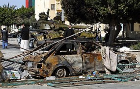 Dozens of people are reported to have died in a second day of fierce fighting for Zawiya.